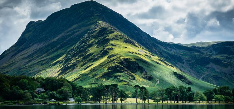 Photograph of hill and lake in the Lake District.